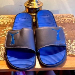 Gently loved men  grey and blue puma slides ssize 12. smoke free.barely worn.
